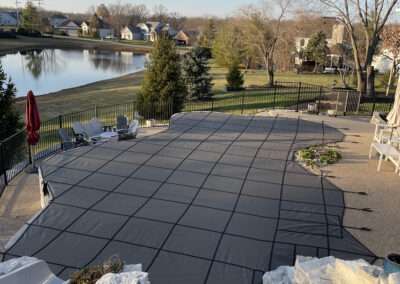 Custom pool cover for pool winterization services