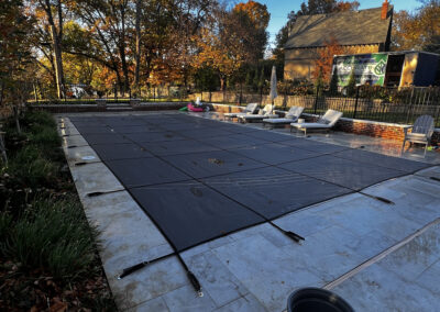 Pool winterization with custom protective cover