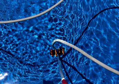 Clear blue swimming pool from pool cleaning services